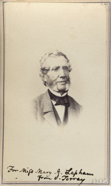 Vignetted carte-de-visite quarter-length portrait of John Torrey (1796-1863), American botanist. Worked as New York state botanist from 1836. Handwritten inscription at bottom of image reads: "For Miss Mary A. Lapham, From J. Torrey, 1865."