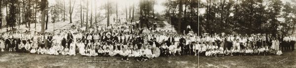 Panoramic group portrait of Chicago, St. Paul, Minneapolis and Omaha Railroad Staff Annual Picnic in Prospect Park.