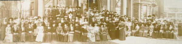 Panoramic group portrait of unidentified women's organization.  Suggested to be suffragists, including Ada James.