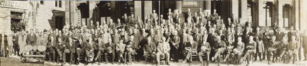 Panoramic group portrait of the Wisconsin Medical Association outside of the Layton Art Gallery.