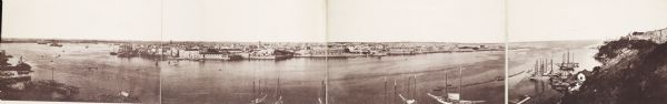 Panoramic collotype of Havana, Cuba harbor. Numerous boats are visible. Sky appears to have been masked out before printing.