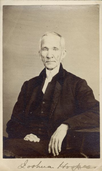 Carte-de-visite portrait of Joshua Hoopes (1788-1874), American Botanist. An infant at the time of the Wyoming Indian massacre, his mother strapped him on her back and fled on horseback to escape death at the hands of the American Indians. In 1834, he opened the "Hoopes Boarding School for Boys" in West Chester. where he was known for his lectures on astronomy and botany. A handwritten inscription at the bottom of the image reads, "Joshua Hoopes."