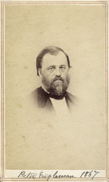Vignetted carte-de-visite portrait of Peter Engelmann (1823-1874), Wisconsin educator and naturalist. Engelman founded the German-English Academy in Milwaukee, which later became the Milwaukee University School. He was also a founder of the Wisconsin Natural History Society, the collection which became the foundation for the Milwaukee Public Museum in 1882. Handwritten inscription at the bottom reads, "Peter Engelmann, 1867."