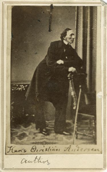 Full-length carte-de-visite portrait of Hans Christian Andersen (1805-1875), Danish poet and author of fairy tales. Inscription at bottom of card reads, "Hans Christian Andersen, Author."