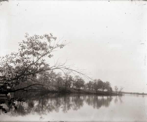 Point in the back of Perkin's House on pond (now Montello Lake).