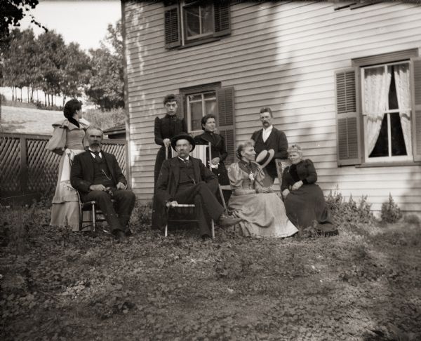 John Barry and his family posed in their yard.