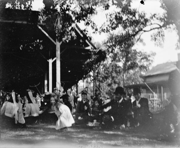 The Tabernacle and attendees at the Monona Lake Assembly.  The assembly, Madison's annual Chautauqua, was held on the site of the present-day Olin Park.