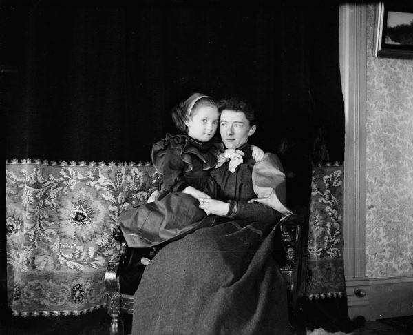 Ada Bass and her daughter Everetta in their parlor.