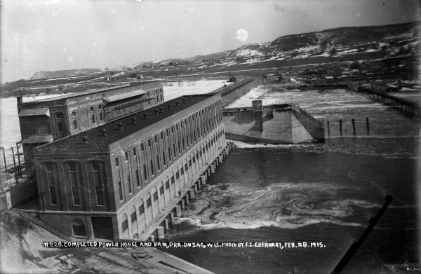 Elevated view, looking east, of the power house, lock, and dam on the Wisconsin River.