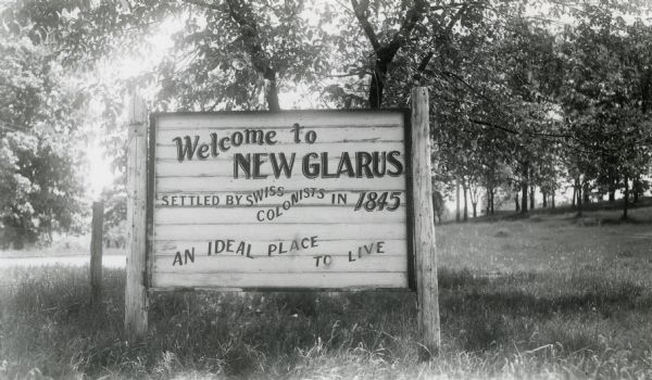 Sign welcoming people to the city of New Glarus.