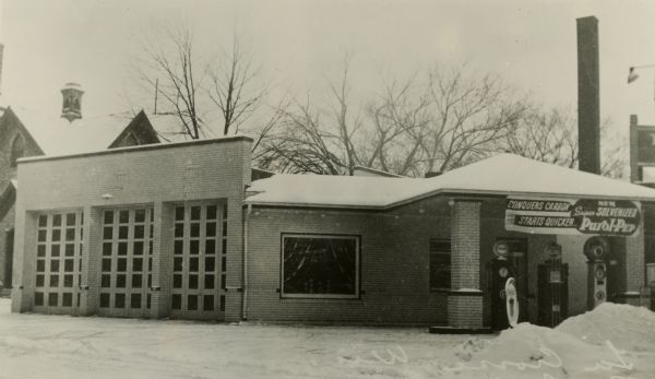 Exterior view of the Pure Oil Service Station at the corner of 4th and Cass taken prior to 1937 renovation.