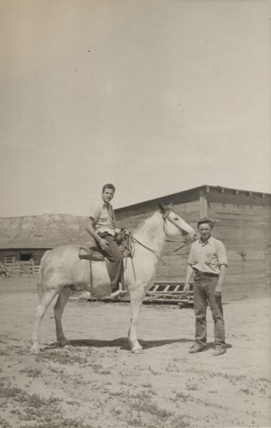 Gaylord Nelson, later Wisconsin governor, United State senator, and a leading environmentalist of his era, on horseback at a ranch in Rosebud, Montana.