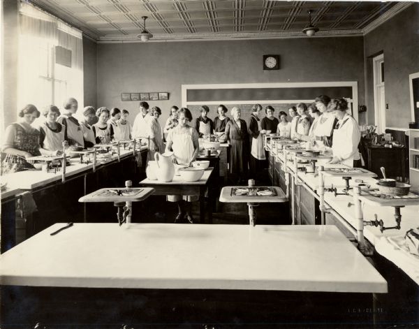 Agricultural extension cooking class, probably at Wausau, supervised by Nellie Kedzie Jones.