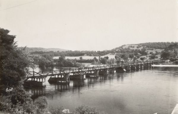 Elevated view of old toll bridge across the Wisconsin River at Prairie du Sac. The view is looking north toward Sauk County.