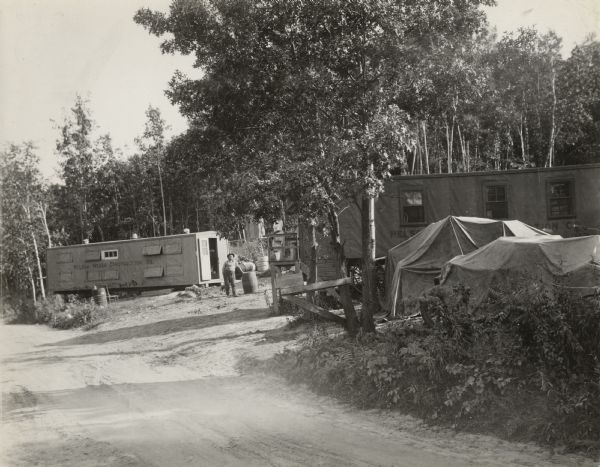 Campground for employees of the Nelson Weber Construction Company photographed for the Wisconsin Good Roads Association during the early 1920s. Such facilities were necessarily provided by road construction companies working in rural areas.