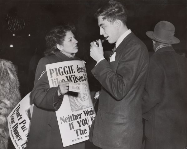 Vi Slovin, an employee of the United Packinghouse Workers District One office in Chicago, working after hours to distribute leaflets about the Wilson & Co. strike to passers-by.