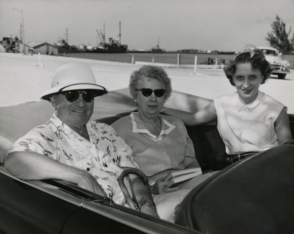 President and Mrs. Truman and Margaret Truman motoring from the Little White House to Truman Beach in Key West.