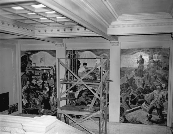 Artist William Ashby McCloy working on his Wisconsin Centennial murals in the State Historical Society of Wisconsin building.