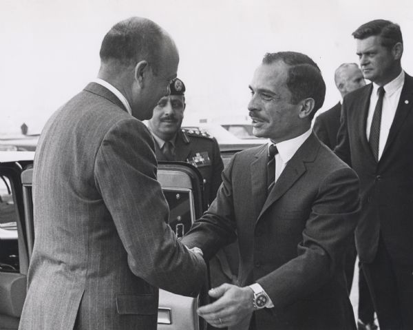 Secretary of Defense Melvin Laird and King Hussein of Jordan at a diplomatic reception in Washington, D.C. Hussein was on a personal mission to attempt to change the Nixon administration's position on the Middle East.