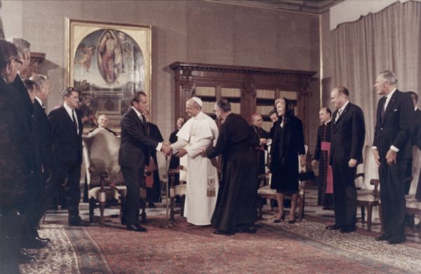 Pope Paul VI greets President Richard Nixon at the Vatican. Secretary of Defense Melvin Laird, second from the right next to Mrs Nixon, accompanied the President on this European trip.