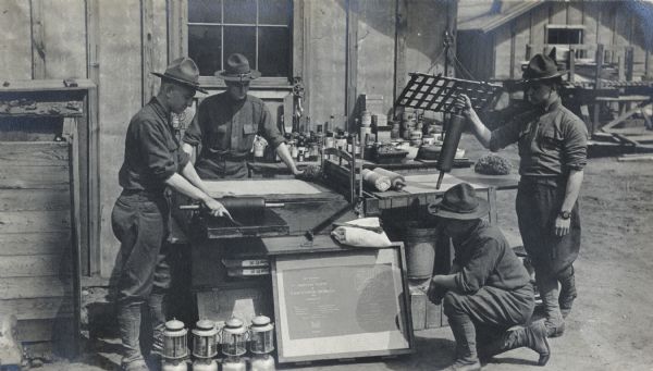 Army engineers at Camp Curtiss, demonstrating zincographic equipment.  Zincography was a form of printing for large maps using zinc plates.