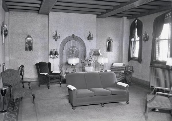 Living room, perhaps the lobby, of the Claridge Apartment Hotel.