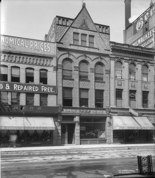 Daily News and Henry Reimer's Photo Materials Buildings | Photograph ...