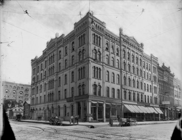 The southeast corner of the Friend Brothers Clothing Company at N. Broadway and E. Michigan Street.