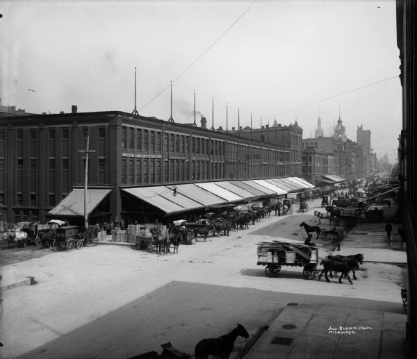A view of Commission Row, known for its fresh produce markets, looking northwest on N. Broadway between E. Buffalo and E. Chicago Streets.