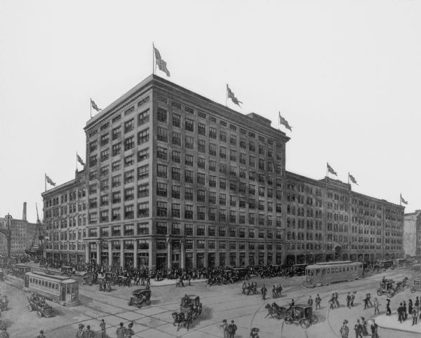Photograph of an illustration. The image is of Gimbels Department Store at the corner of W. Wisconsin and N. Plankinton Avenues. Possibly a drawing of a planned (but never executed) expansion of the department store.