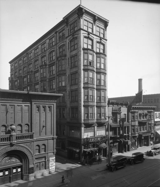 Elevated view of N. 3rd Street, south of W. Wisconsin Avenue. Landmarks left to right: Schlitz Palm Garden, Hotel Charlotte, Randolph Garden and Hotel Randolph along the 200 and 300 block of West Wisconsin Avenue.