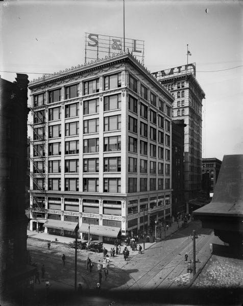 Elevated view of the Southwest corner of North 2nd Street and West Wisconsin Avenue, with Stumpf and Langhoff clothing building on the left, and Majestic Building on the right.
