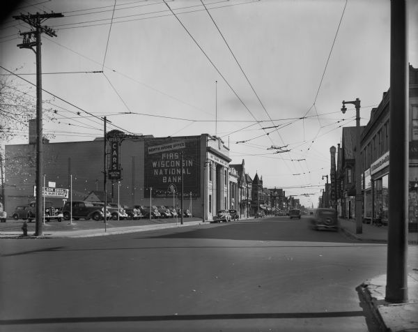 N. 35th Street and W. North Avenue, looking west along the north side of the street, with the First National Bank and Bloch Daneman buildings.