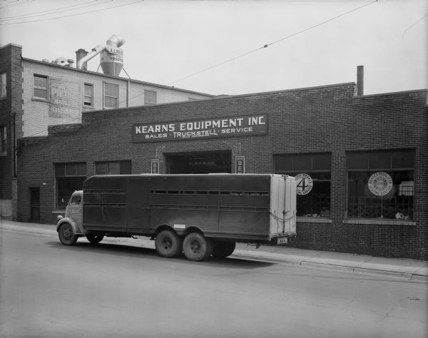 E.H. Barnes truck parked in front of the Kearns Equipment Inc., building, 3539 W. State Street.
