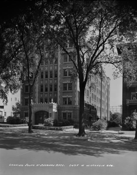 Front view of Sheridan Apartments. Caption on negative reads, "Looking South at Sheridan Apts. 2435 W. Wisconsin Ave."