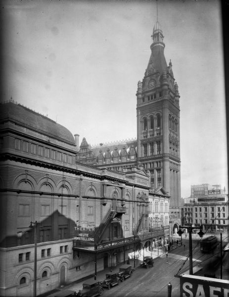 Elevated view looking northeast at the Pabst Theater and City Hall on Wells Street, east of the Milwaukee River.