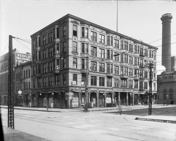 Cawker Building and surrounding commercial district at the northeast corner of N. Plankinton and W. Wells Streets.