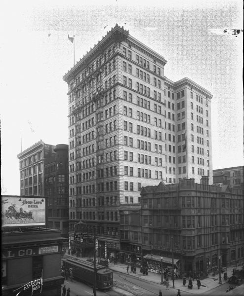 Elevated view of the southeast corner of West Wisconsin Avenue and North 3rd Street. The Majestic Building is in the center while the Schlitz Hotel is on the left.