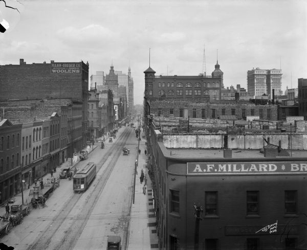 Elevated view looking north on N. Water Street from W. St. Paul Avenue. City Hall is in the left background.