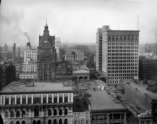 Looking west from the roof of the Wells Building at E. Wisconsin Avenue and N. Milwaukee Street. The Pabst Building is on the left and the First National Bank is on the right.