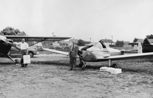 Distribution of campaign literature for Joseph R. McCarthy's primary campaign by the Young Republican's Flying Badger Squadron. The two pilots photographed at an unidentified airport are thought to be Roland Sephenson of Cedarburg and Ralph Emling of Milwaukee. This campaign allowed McCarthy to blanket the state with his literature.