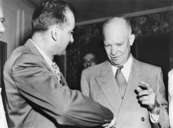 Senator Joseph R. McCarthy of Wisconsin congratulates Dwight Eisenhower after his nomination at the Republican Convention.  Eisenhower is thought to have disliked McCarthy, in part because of his attack's on Eisenhower's friend and former commander George C. Marshall.  On the campaign train to Wisconsin, Eisenhower subjected McCarthy to heated criticism.  Nevertheless, Eisenhower was careful during the campaign not to offend McCarthy's admirers in public, and he removed a planned defense of General Marshall from a Wisconsin speech text.