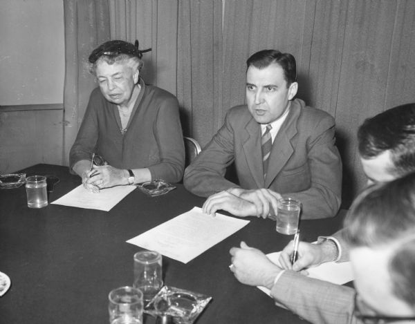 James E. Doyle Sr., head of the Americans For Democratic Action (1953-1954), at an ADA meeting (perhaps 1954) with Eleanor Roosevelt. As chair of the Wisconsin party from 1951 to 1953 Doyle guided the party's campaign against Senator Joseph R. McCarthy. In 1954 Doyle  ran for governor, but was defeated in the Democratic Party primary by Wiliam Proxmire.