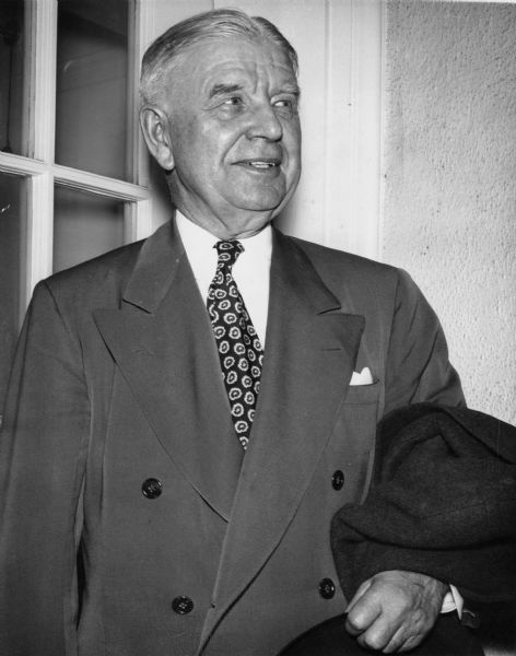 William T. Evjue, editor and publisher of the Madison "Capital Times," who was well-known for his "crusades" such as his opposition to gambling, Senator Joseph R. McCarthy, and Congressman Alvin O'Konski, as well as his support for Frank Lloyd Wright and the Madison Auditorium. He is seen here leaving the White House shortly after Senator McCarthy made national headlines with a speech at Wheeling, West Virginia. According to the original AP caption, Evjue told President Truman that McCarthy was "not a man to be setting a pattern of Americanism or patriotism for anybody."