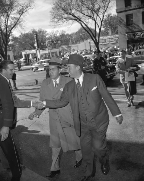 Democratic Presidential candidate Adlai Stevenson arriving at the Loraine Hotel for a speaking engagement. During the campaign Senator Joseph R. McCarthy repeatedly referred to Stevenson as "Alger" rather than Adlai, thereby associating the candidate with Alger Hiss.
