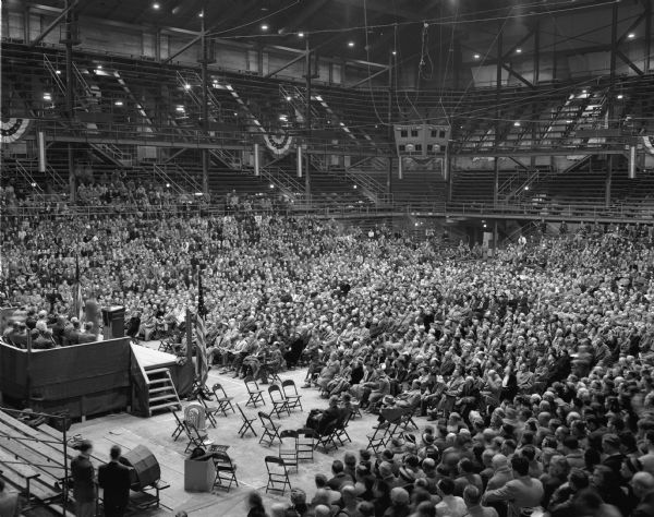Senator Robert A. Taft speaking to a large audience at the University of Wisconsin-Madison Field House shortly before the April 1 Wisconsin Presidential primary.