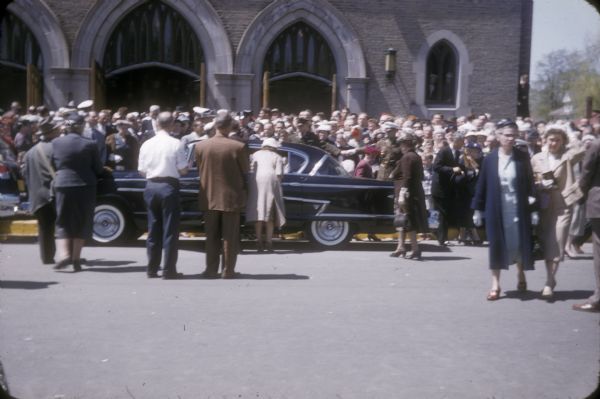 Crowd of mourners at the funeral of Senator Joseph R. McCarthy outside St. Mary's Roman Catholic Church.