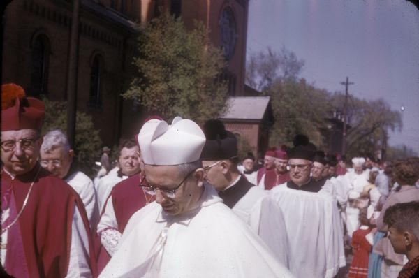 Procession of Catholic clergy at the funeral of Senator Joseph R. McCarthy. In Wisconsin, and elsewhere in the nation, the Catholic Church was among McCarthy's most ardent supporters.