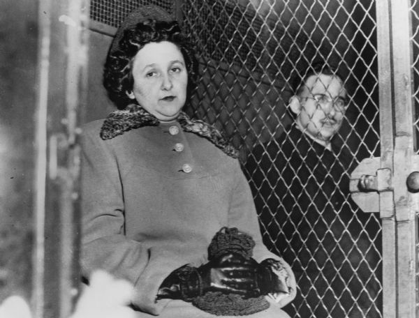 Julius and Ethel Rosenberg in custody. The Rosenbergs were convicted of spying for the Soviet Union on March 29, 1951, and sentenced to death. The climate surrounding their trial was enflamed in part by the charges Senator Joseph R. McCarthy was then making about Soviet spies; at the same time their eventual conviction lent credence to McCarthy's allegations.