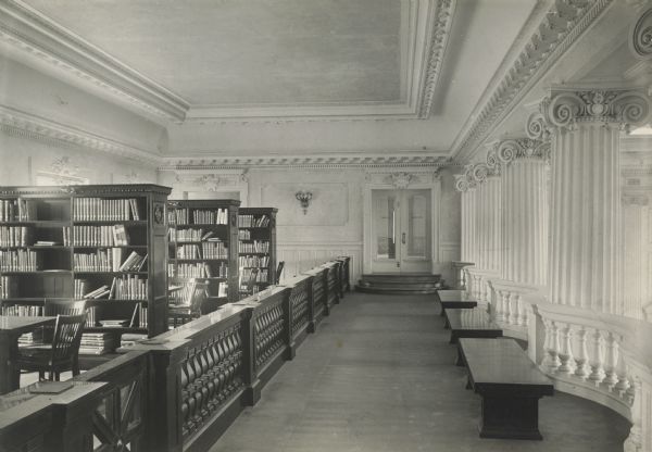 Visitors Gallery and art book collection on the third floor of the Wisconsin Historical Society Building.  This image appears on page 91 of the Historical Society Memorial Volume. A similar image but with a wider view can be found in Lot 1148, a University of Wisconsin student album.
